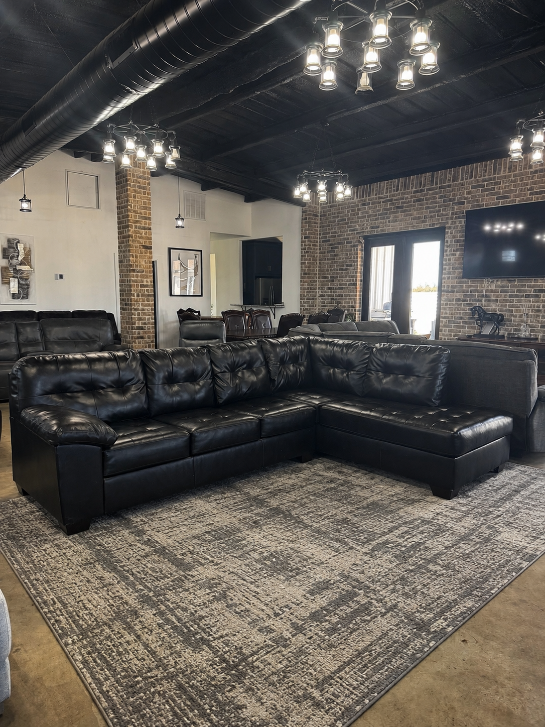 Ashley Furniture Black Faux Leather L-Sectional with Chaise