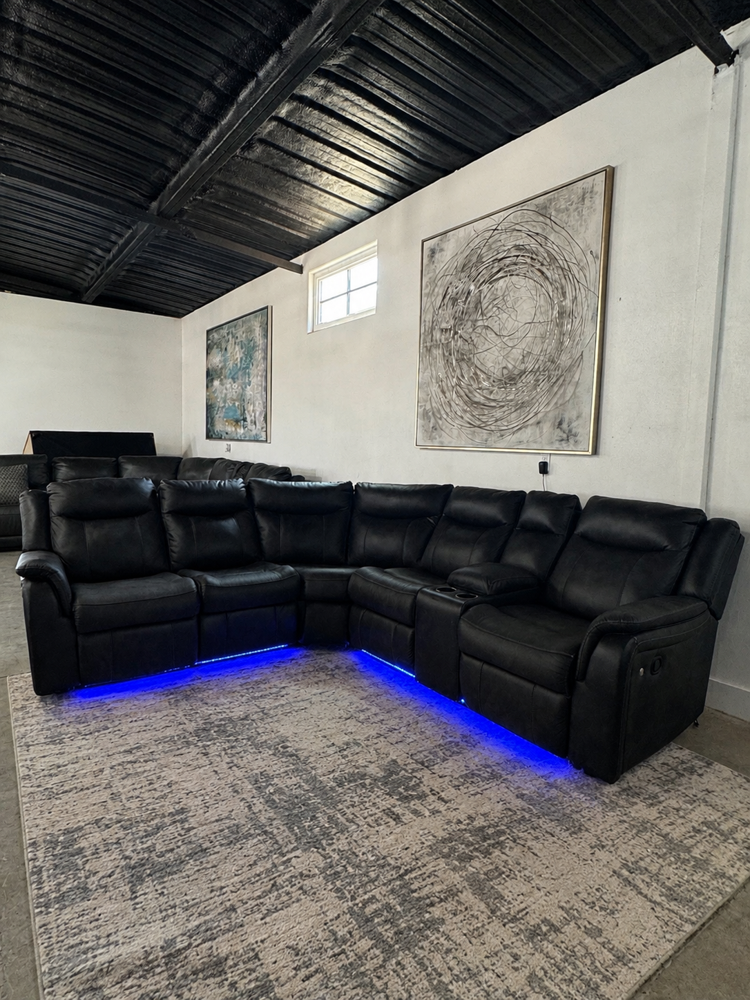 Ashley Black Leather Manual Reclining Sectional with LED Lighting